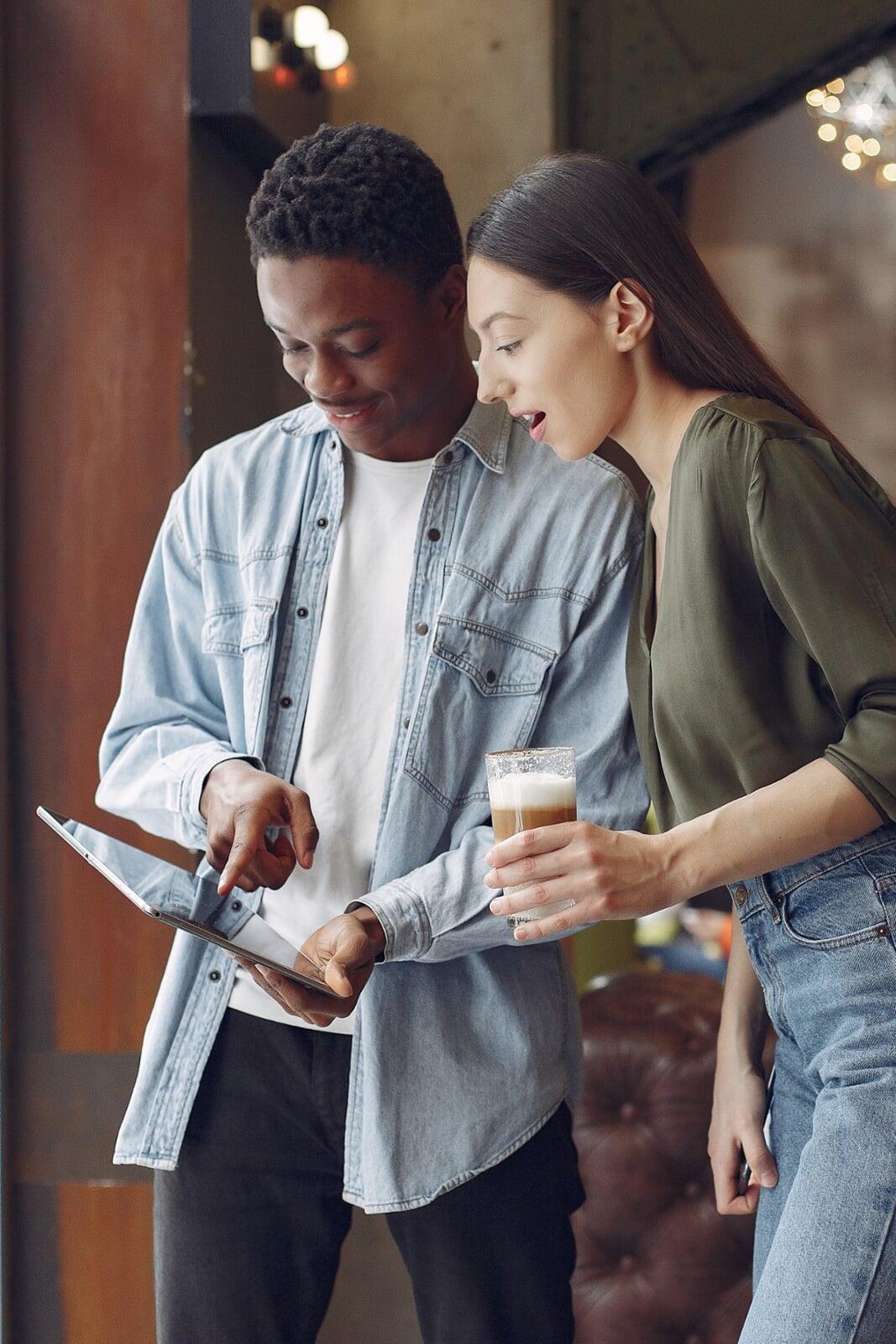 Customers using Wi-Fi in a cafe